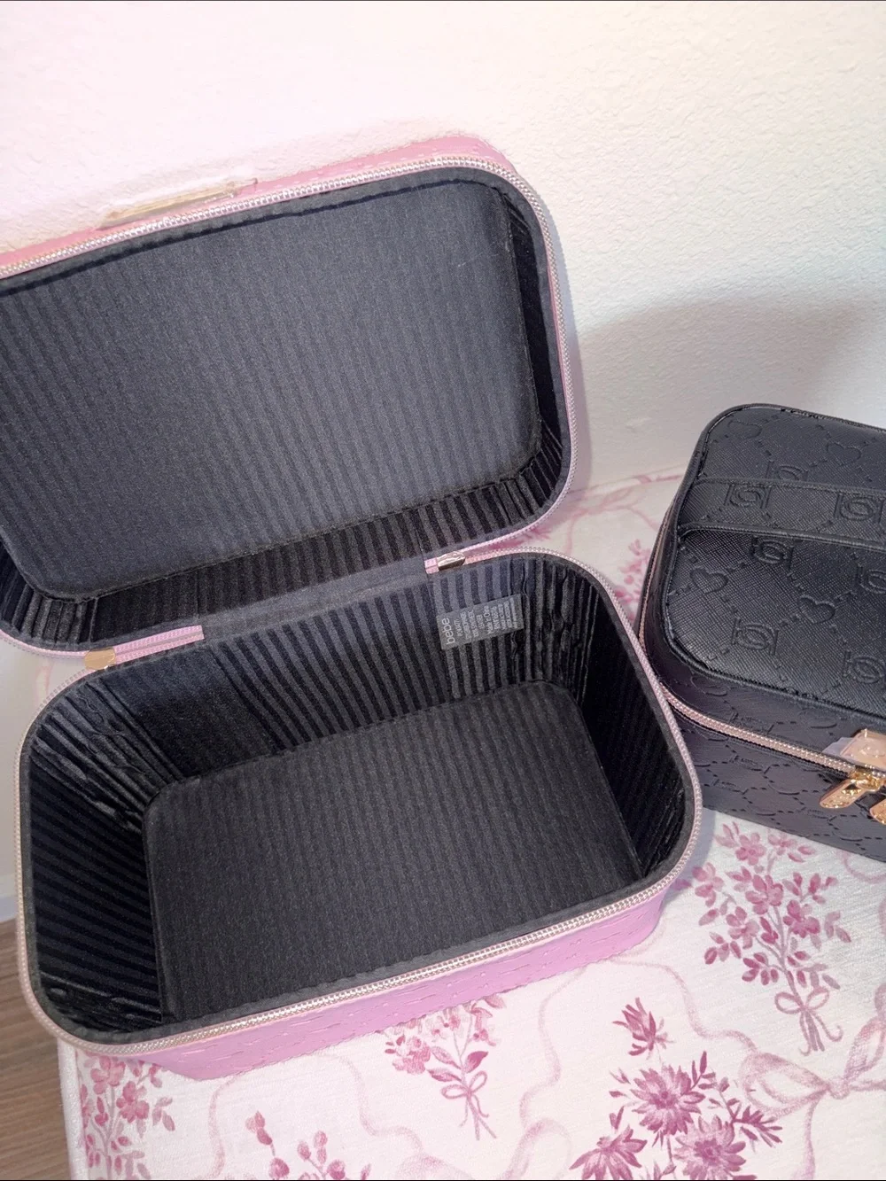 bebe Pink and Black Embossed Cosmetic Train Case Set with Gold Hardware